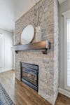 /full stone fireplace with mantle.jpg